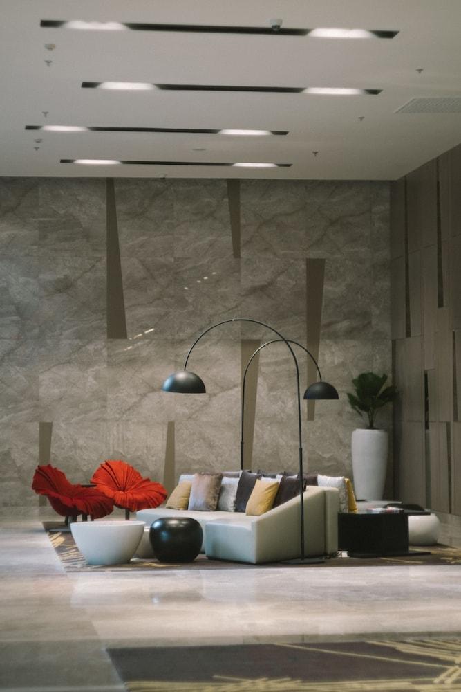 Seda Vertis North Quezon City Exteriör bild A three-armed floor lamp