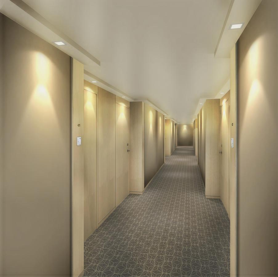 Seda Vertis North Quezon City Exteriör bild A typical hotel corridor