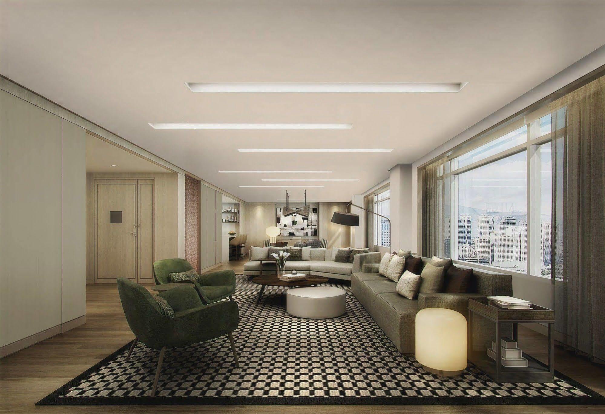 Seda Vertis North Quezon City Exteriör bild The living room of a three-bedroom apartment